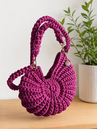 Fuschia shell crochet bag with cross body strap
