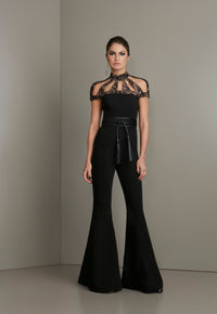 Black Bell Bottom Jumpsuit with Nude and Black Lace Top Cutouts
